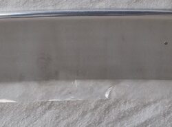 GRILL FINISHER LOWER ALLOY